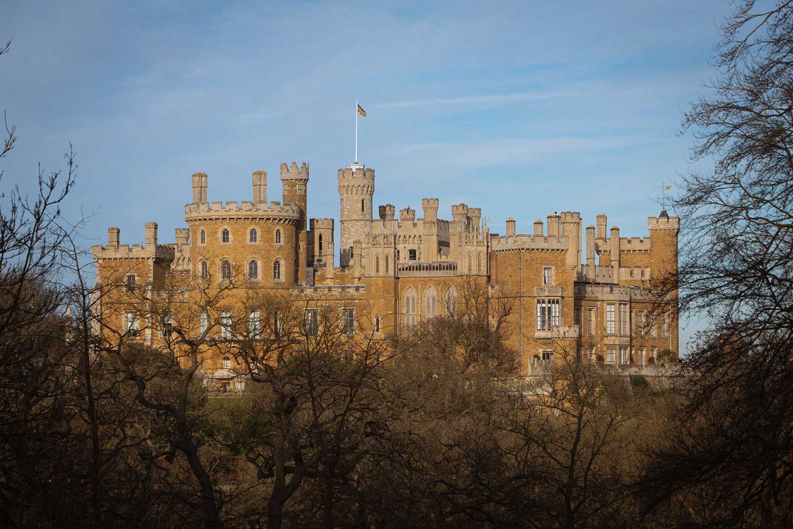 Exterior of Belvoir Castle with trees in the foreground